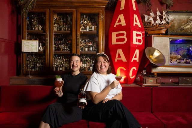 Mix Haus Founders Shirley Yeung and Pippa Canavan toasting their new fundraising initiative with a bottle of St. Rémy Signature