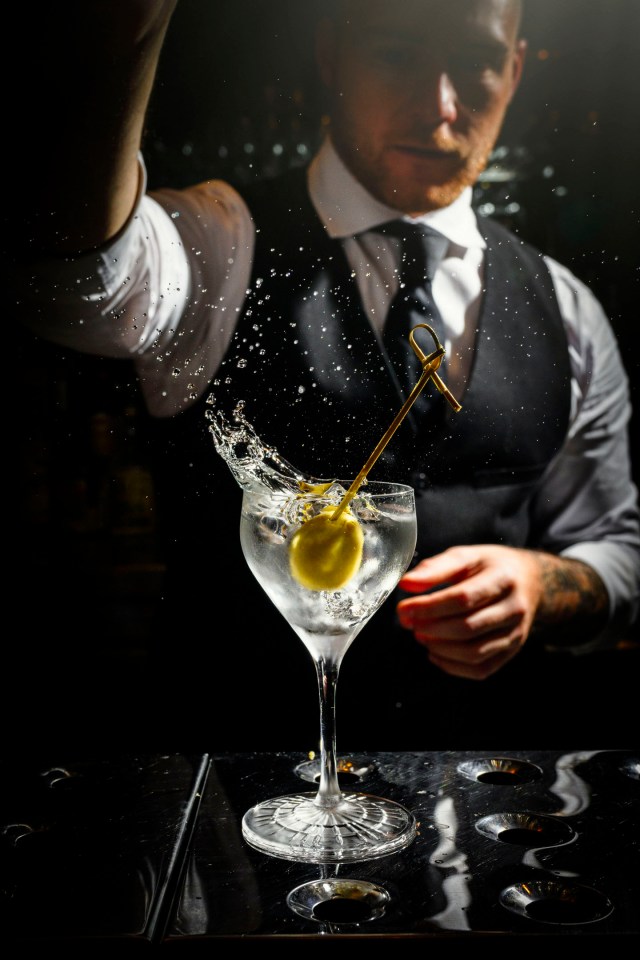 Rockpool Sydney's Bar Manager Leonardo Zuccardi Merli serving a cocktail at the Sydney venue